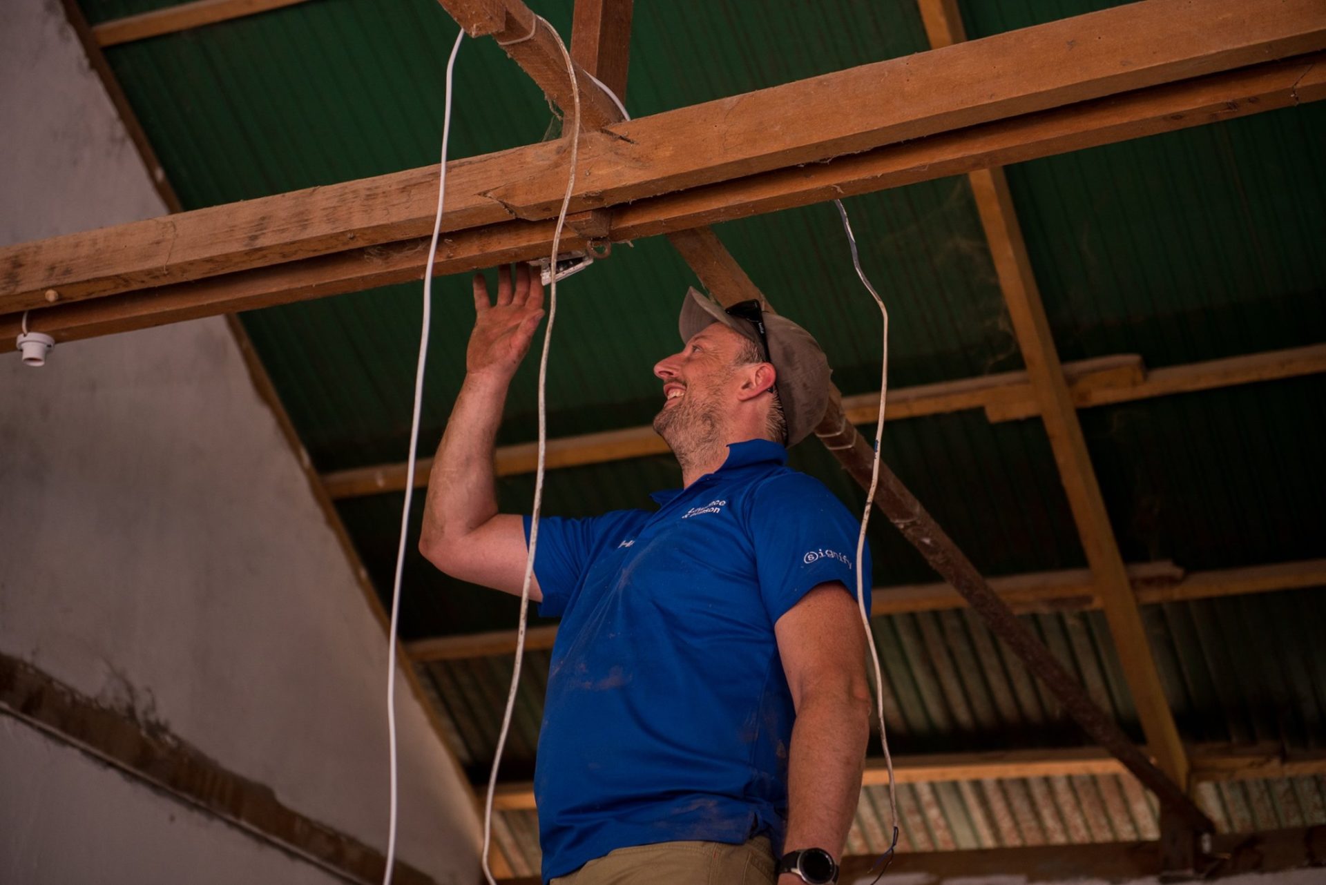 A person performing domestic electrical repairs in Ballarat